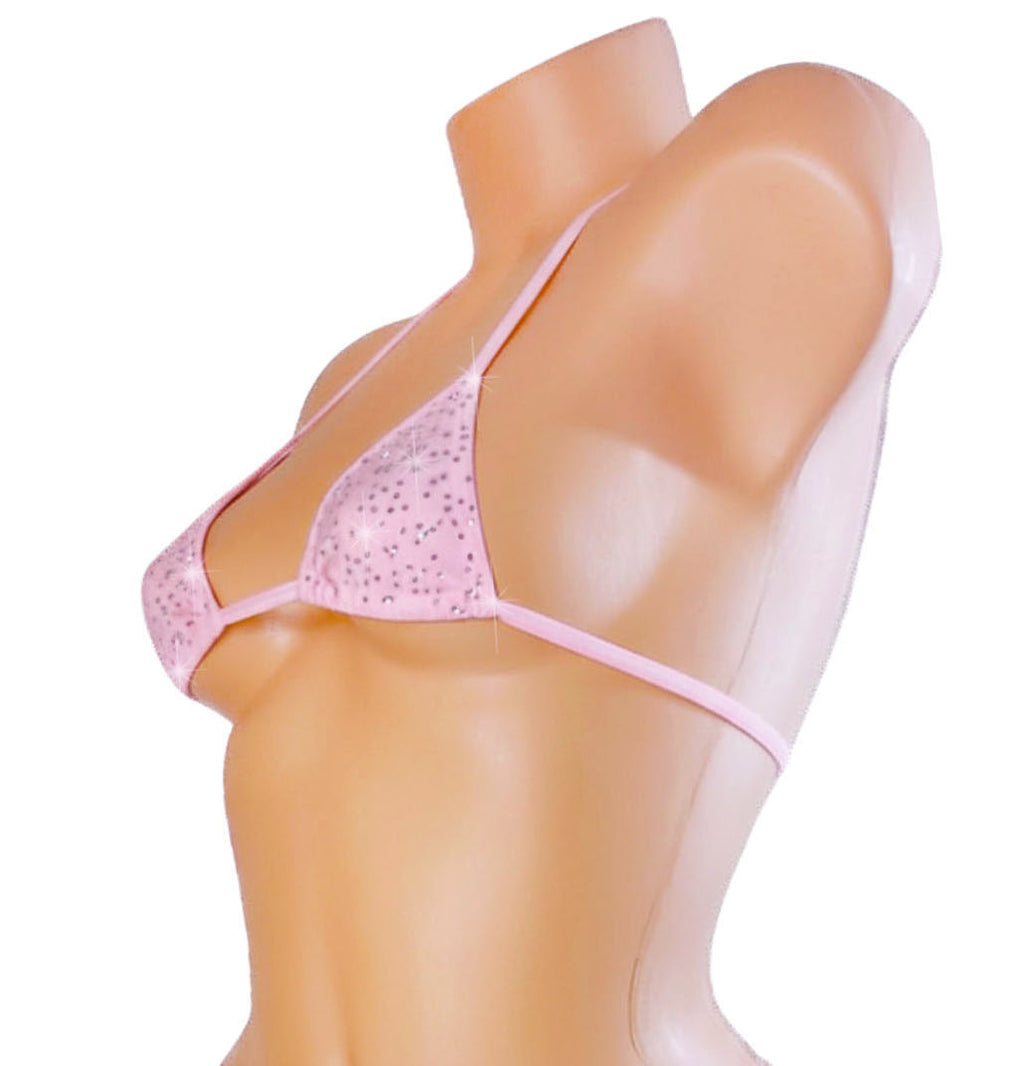 Pink triangle bikini on a mannequin with a white background