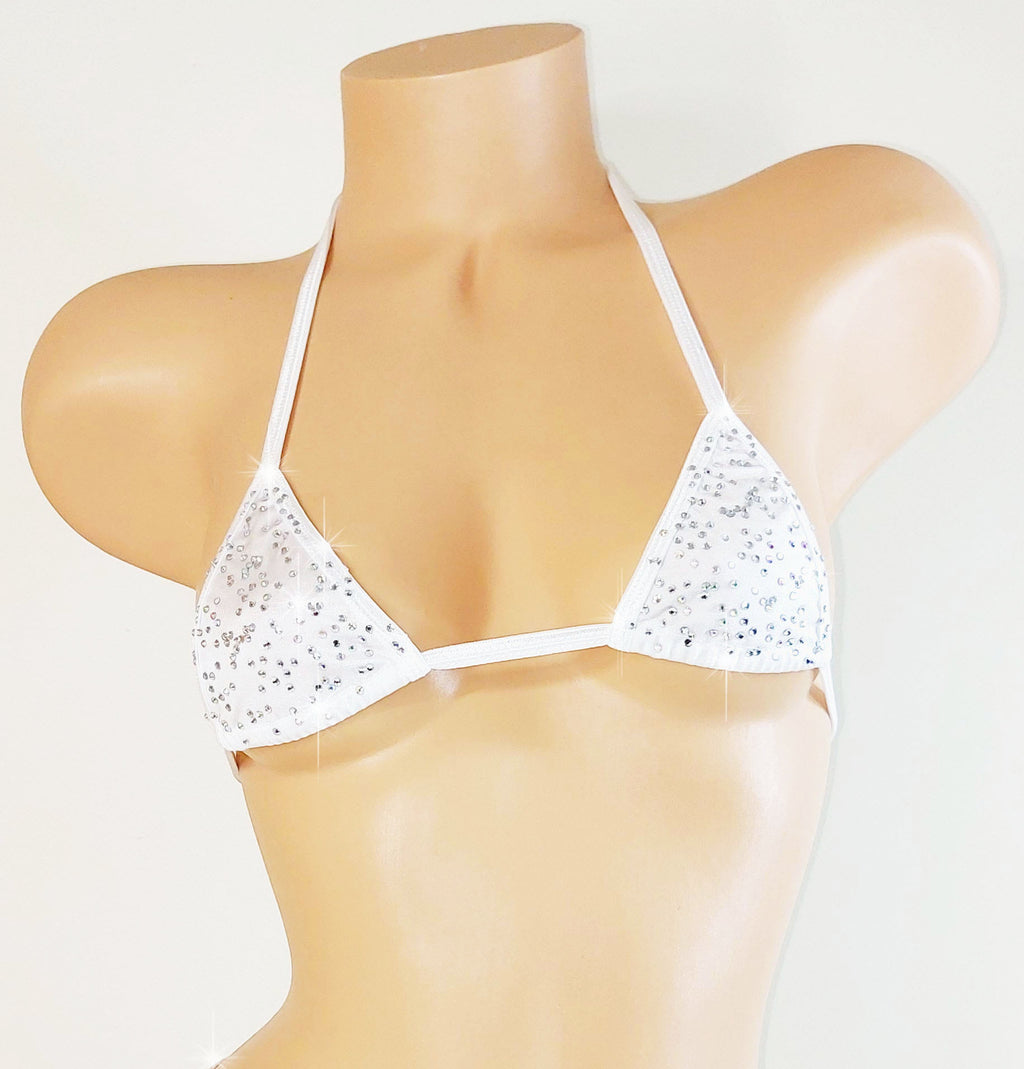 White bedazzled rhinestone bikini top with thin straps on a mannequin against a light gray background