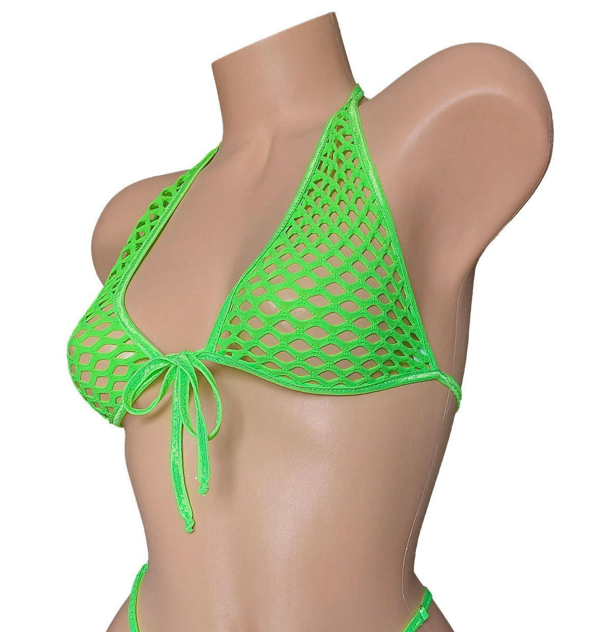 Neon green fishnet bikini on a mannequin against a white background