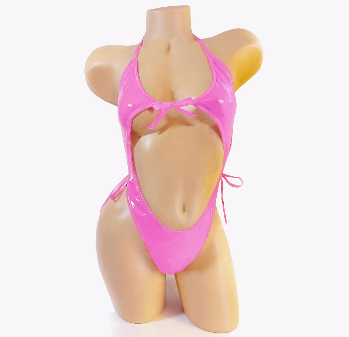 A Pink Vinyl wet look one piece backless outfit on a plastic beige mannequin torso against a plain background.