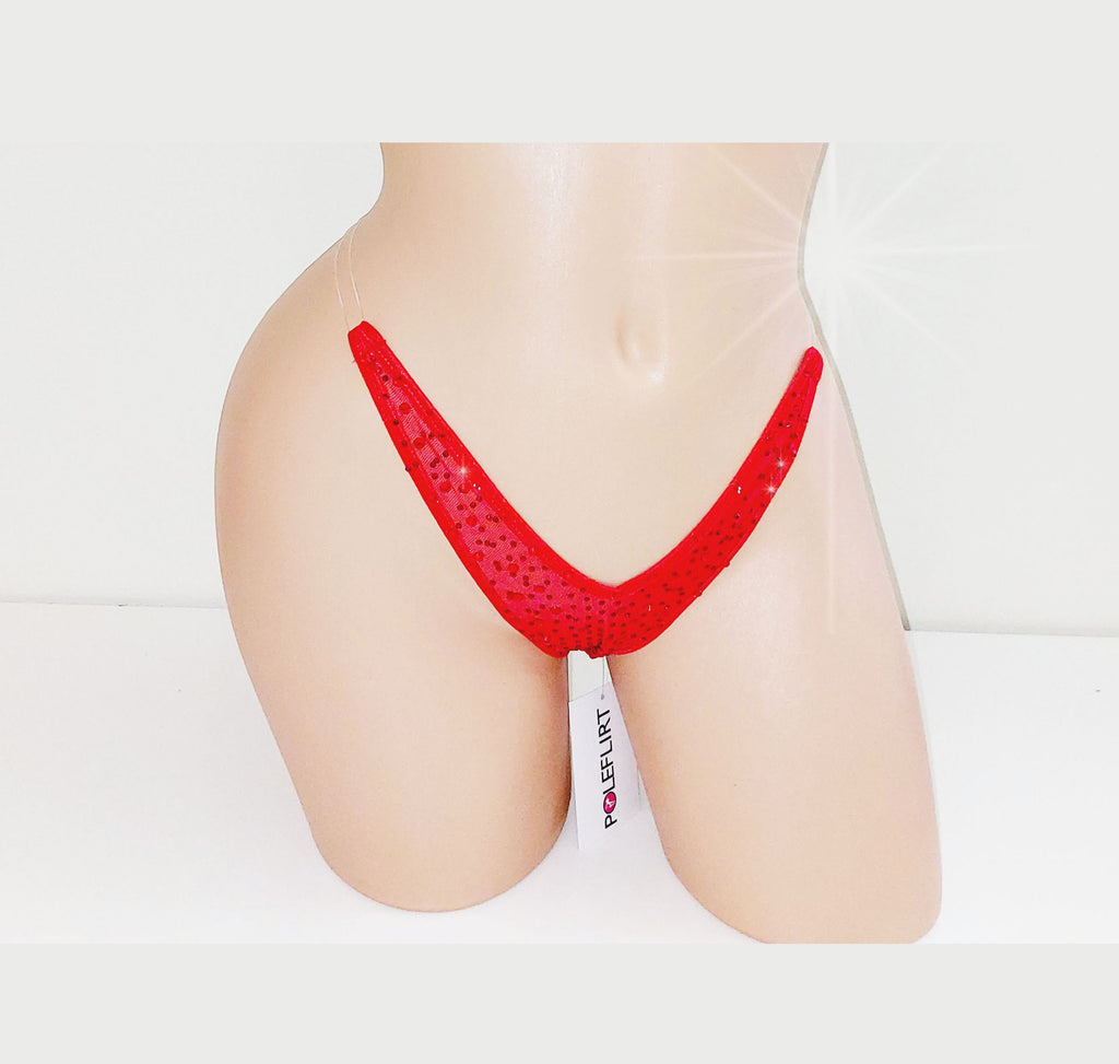Plastic mannequin torso displaying a tiny red micro thong with clear elastic straps that look invisible and it is covered in sparkling red rhinestones.