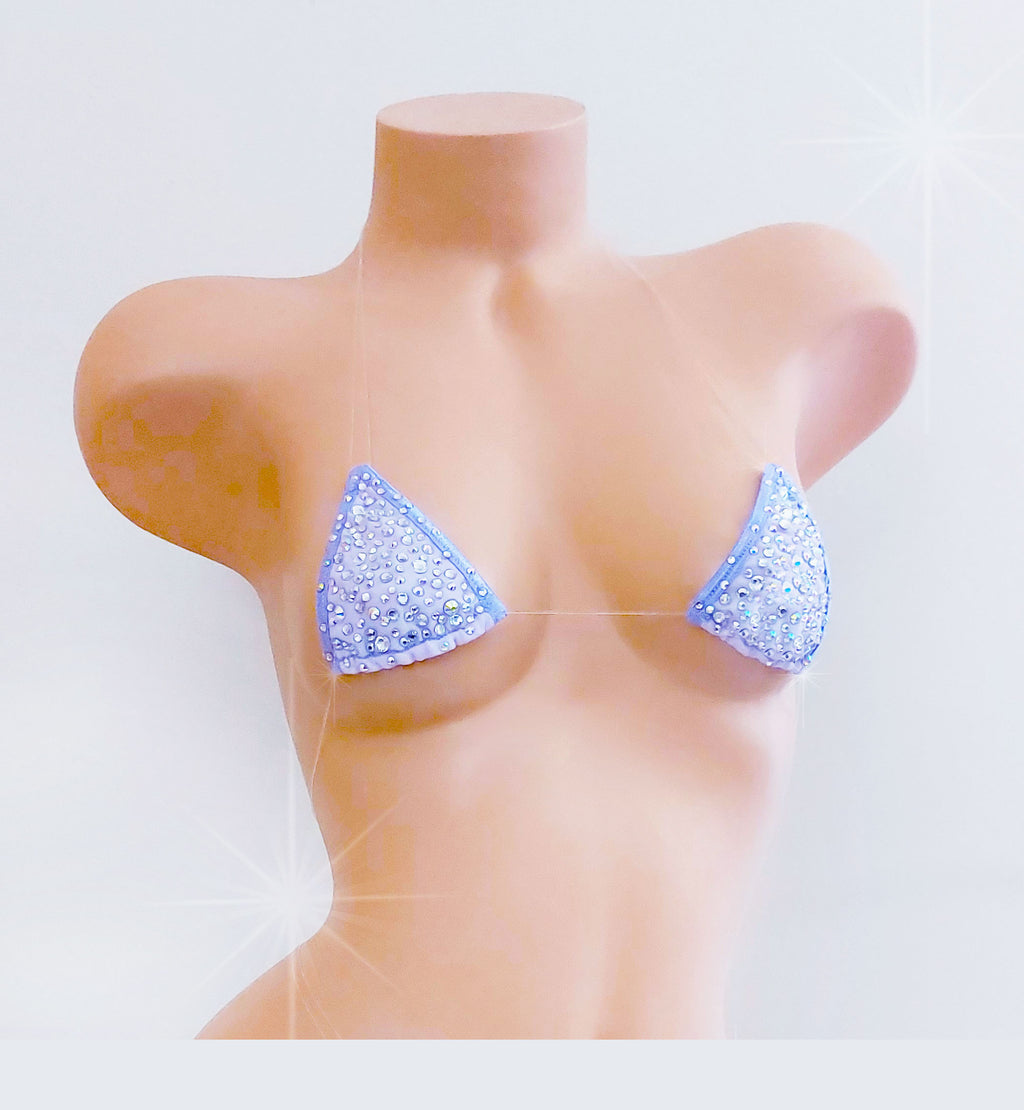 A light lilac purple rhinestone triangle bralette displayed on a tan female mannequin torso against a white background with digital starburst effects.