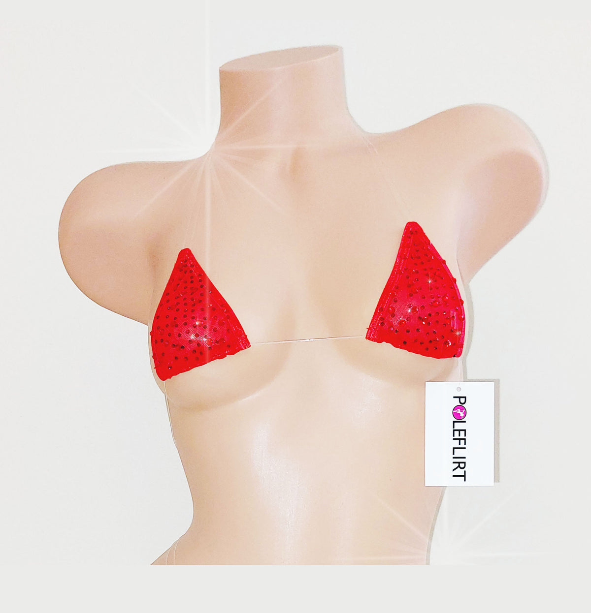 Red rhinestoned triangle bra cups displayed on a beige mannequin torso against a light gray background, with a small POLERFLIRT brand tag visible near the lower right side.