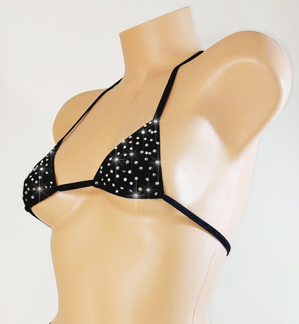 Black bikini top with sparkling embellishments on a mannequin against a white background