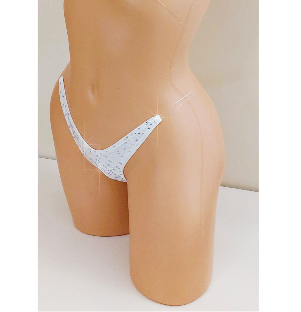 White bikini g-string thong with clear straps and rhinestones.