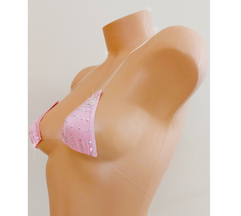 A light pink triangle bikini top with rhinestone embellishments, displayed on a beige mannequin torso against a light gray background.
