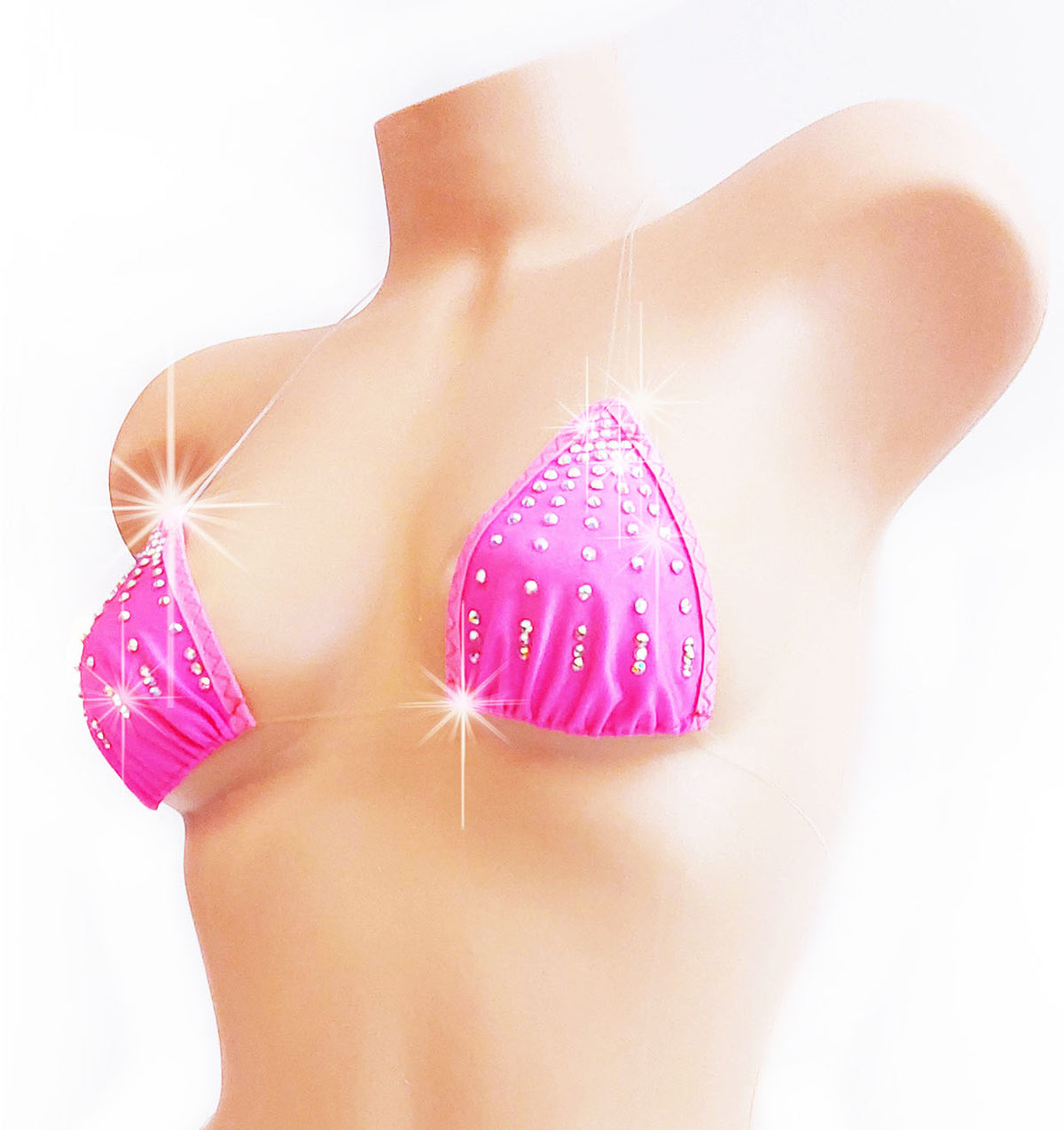 Hot Pink bikini top with clear strings that look invisible, adorned with rhinestones, on a plastic beige female mannequin torso.