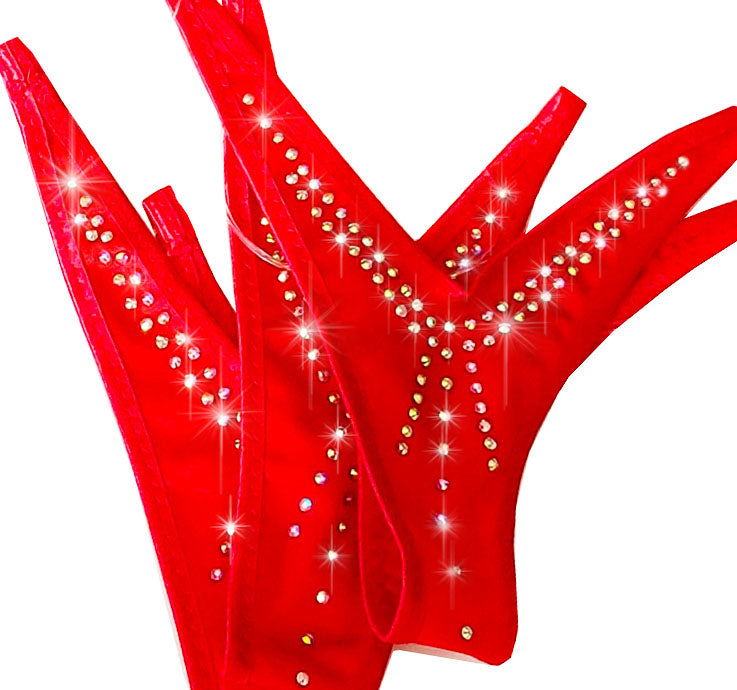 A pair of bright red g-string thongs bedazzled with sparkling rhinestones and AB-toned crystals, shown against a plain white background.